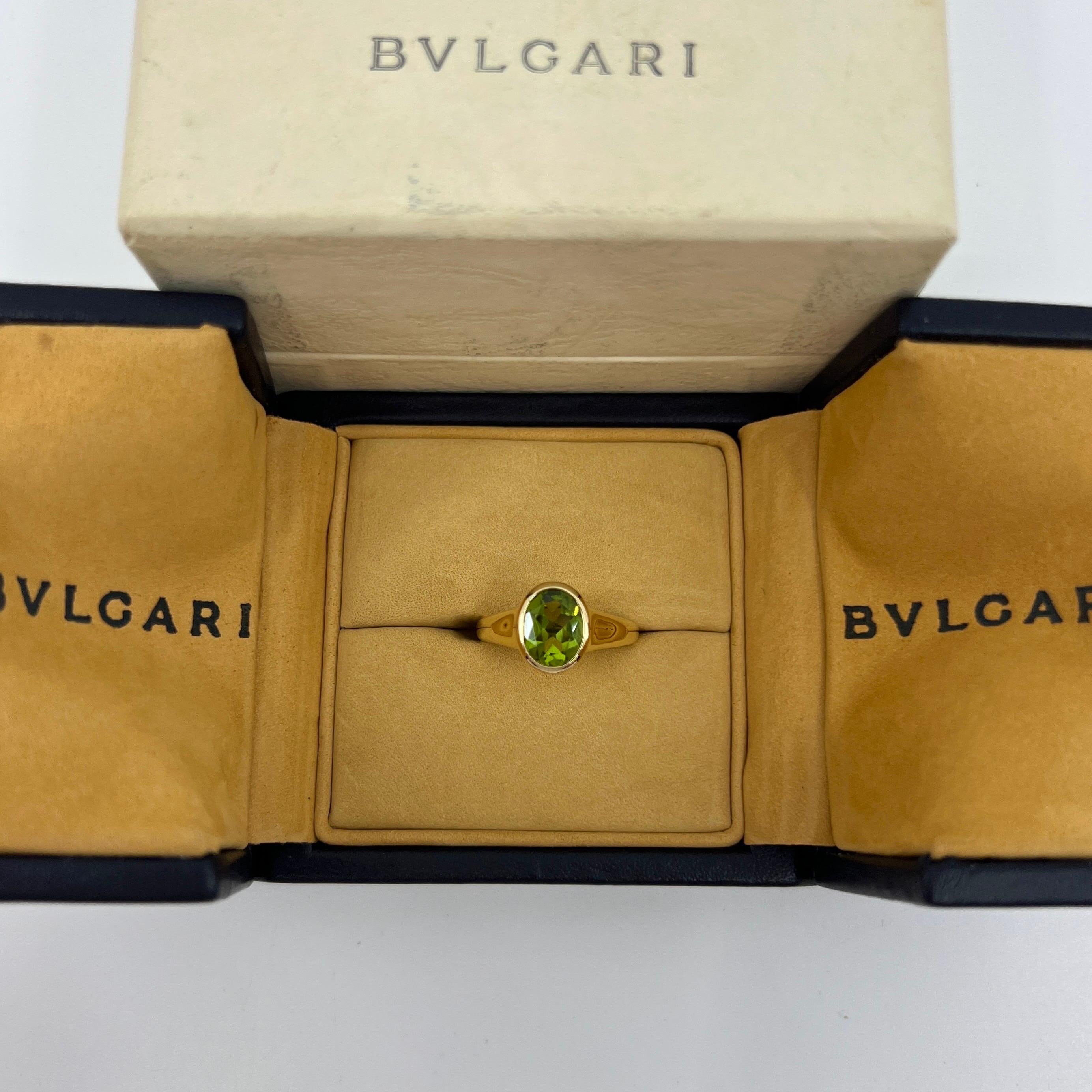 Rare Bvlgari Green Peridot Oval 18k Yellow Gold Signet Style Bezel Rubover Ring For Sale 4