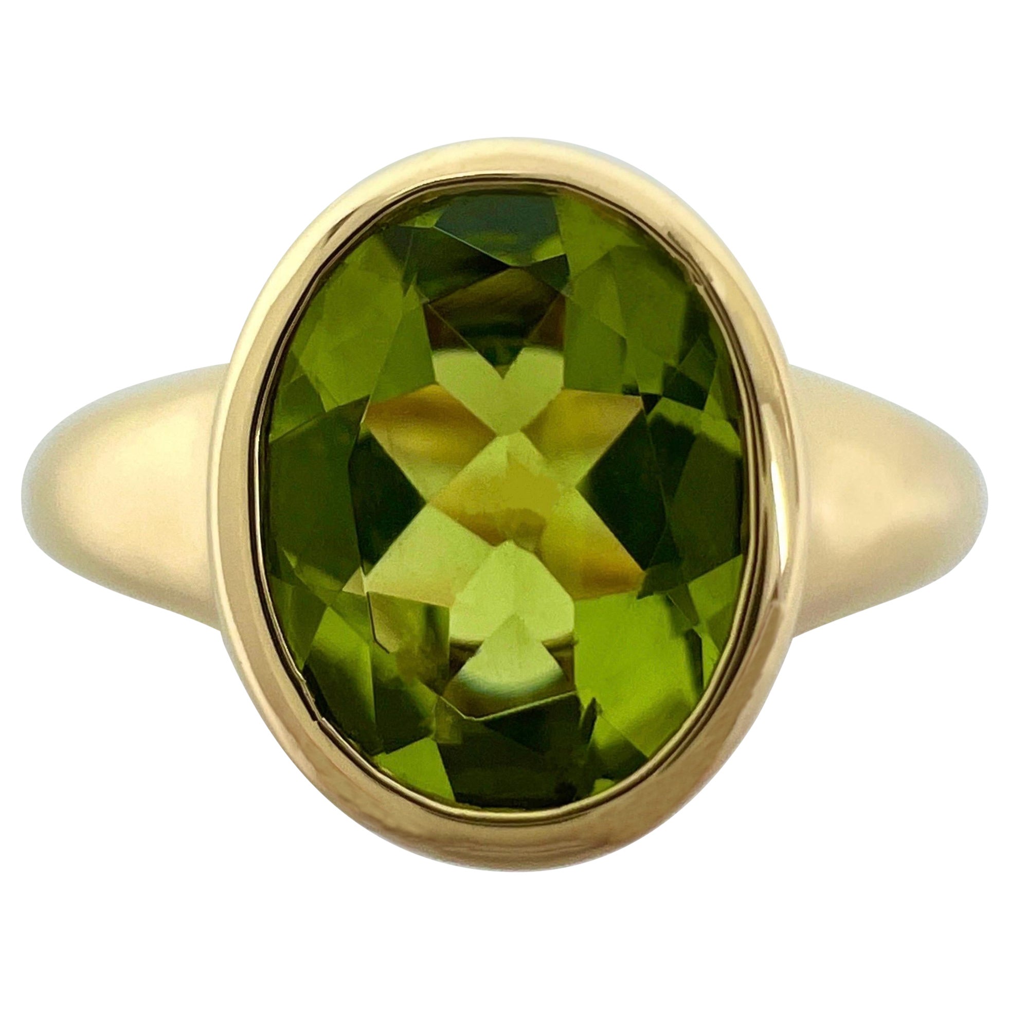 Rare Bvlgari Green Peridot Oval 18k Yellow Gold Signet Style Bezel Rubover Ring