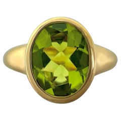 Rare Bvlgari Green Peridot Oval 18k Yellow Gold Signet Style Bezel Rubover Ring