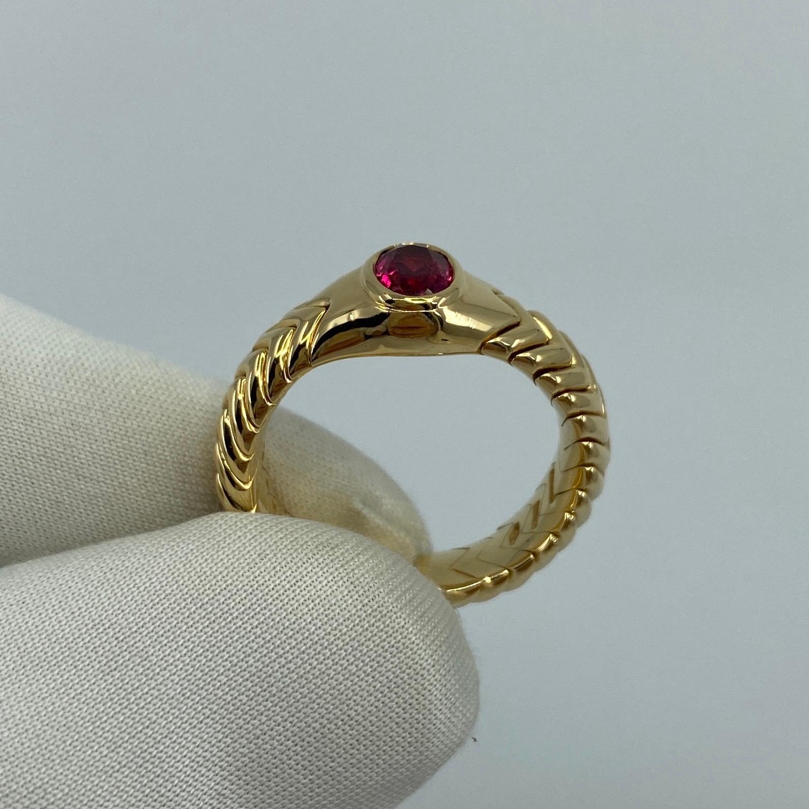 Rare Bvlgari Pink Tourmaline Serpenti 18k Yellow Gold Ring.

The classic Bulgari snake theme, this 18K yellow gold ring comfortably wraps around your finger with a flexible design.
The ring is set with a beautiful oval cut natural vivid pink