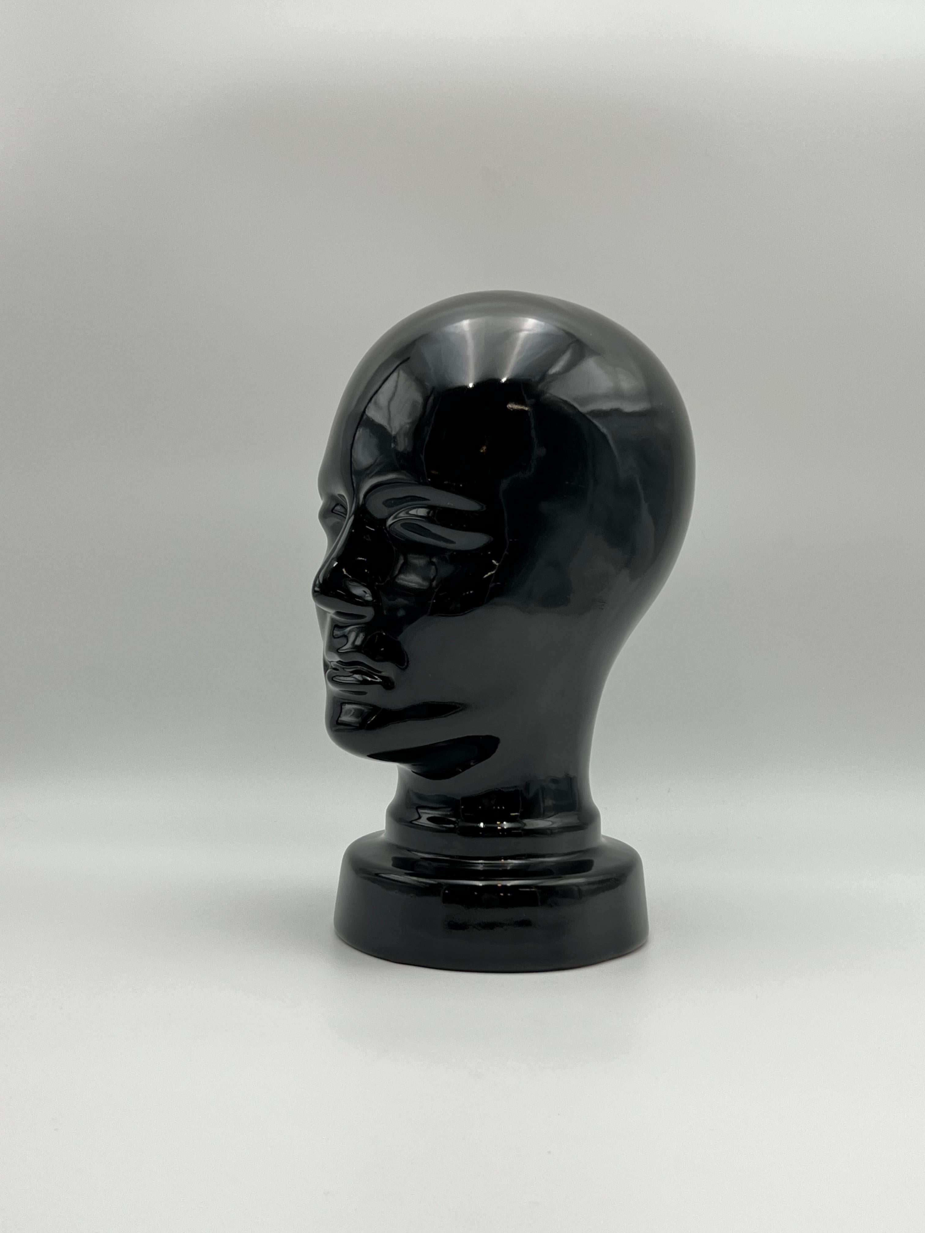 **Rare Vintage Ceramic Sculpture – West Germany, 1970s**  

This rare vintage ceramic sculpture, crafted in West Germany during the 1970s. Made from glossy black glazed ceramic, this artisanal figurine showcases exceptional craftsmanship. Its sleek,