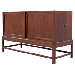 Rare cabinet in mahogany with sliding doors by Kaare Klint