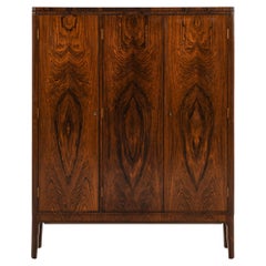 Rare armoire en bois de rose, acajou et laiton, années 1930