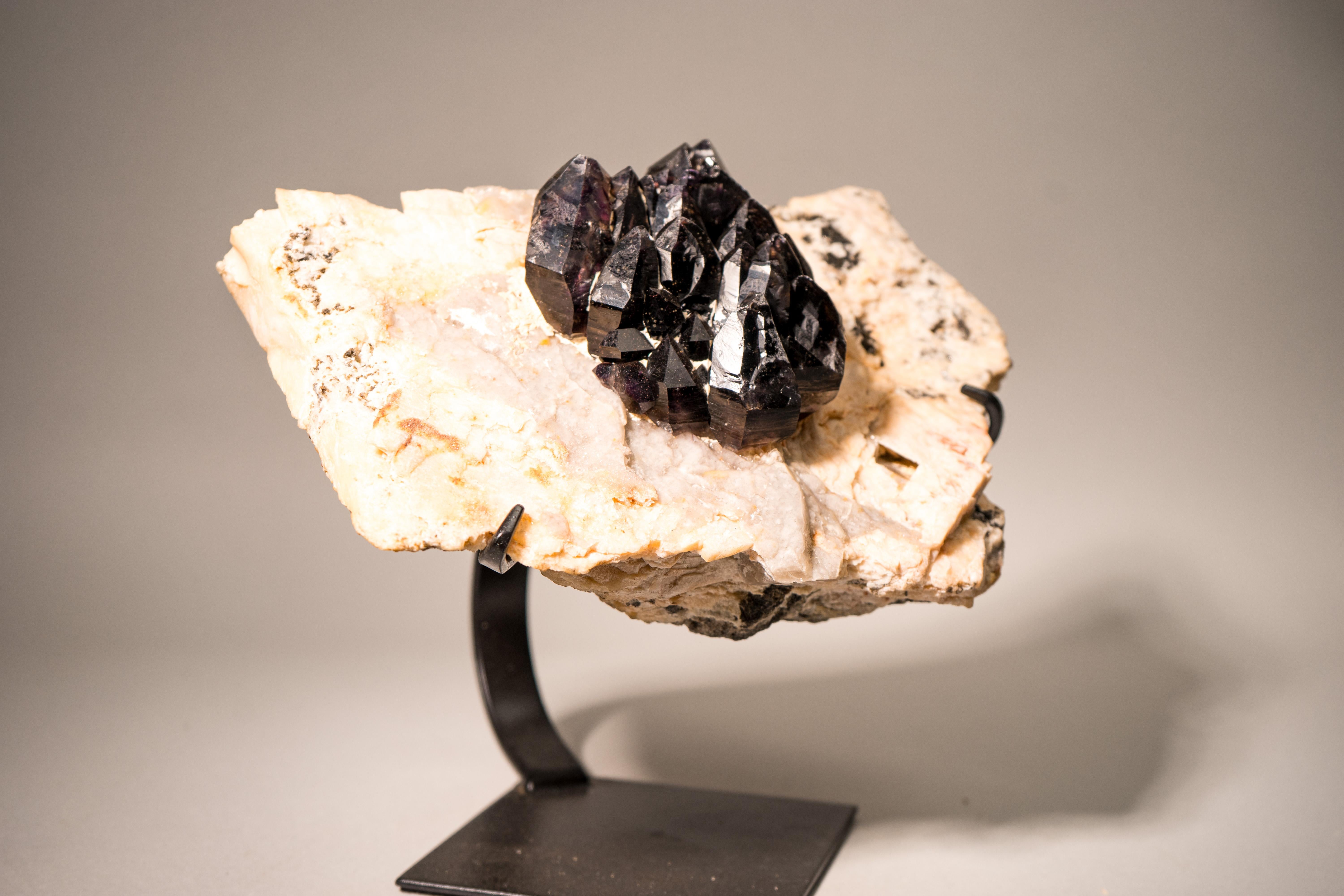 Elestial Amethyst Crystal Specimen with Brazil’s Legendary Cacoxenite

▫️ Description

An exceedingly rare mineral masterpiece: a Matrix Cacoxenite Amethyst specimen is gracefully set on a natural feldspar and quartz matrix and has its origins from