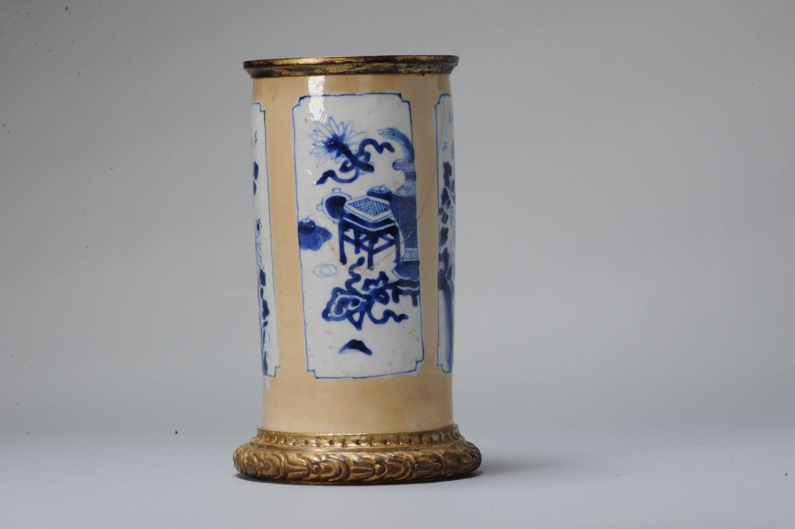 China, blue and white vase on a Cafe au lait ground with ormulu mounting. Very unusual piece. Lovely example of the Kangxi period.

The original piece was probably a sleeve vase which was cut off.

Additional information:
Material: Porcelain &