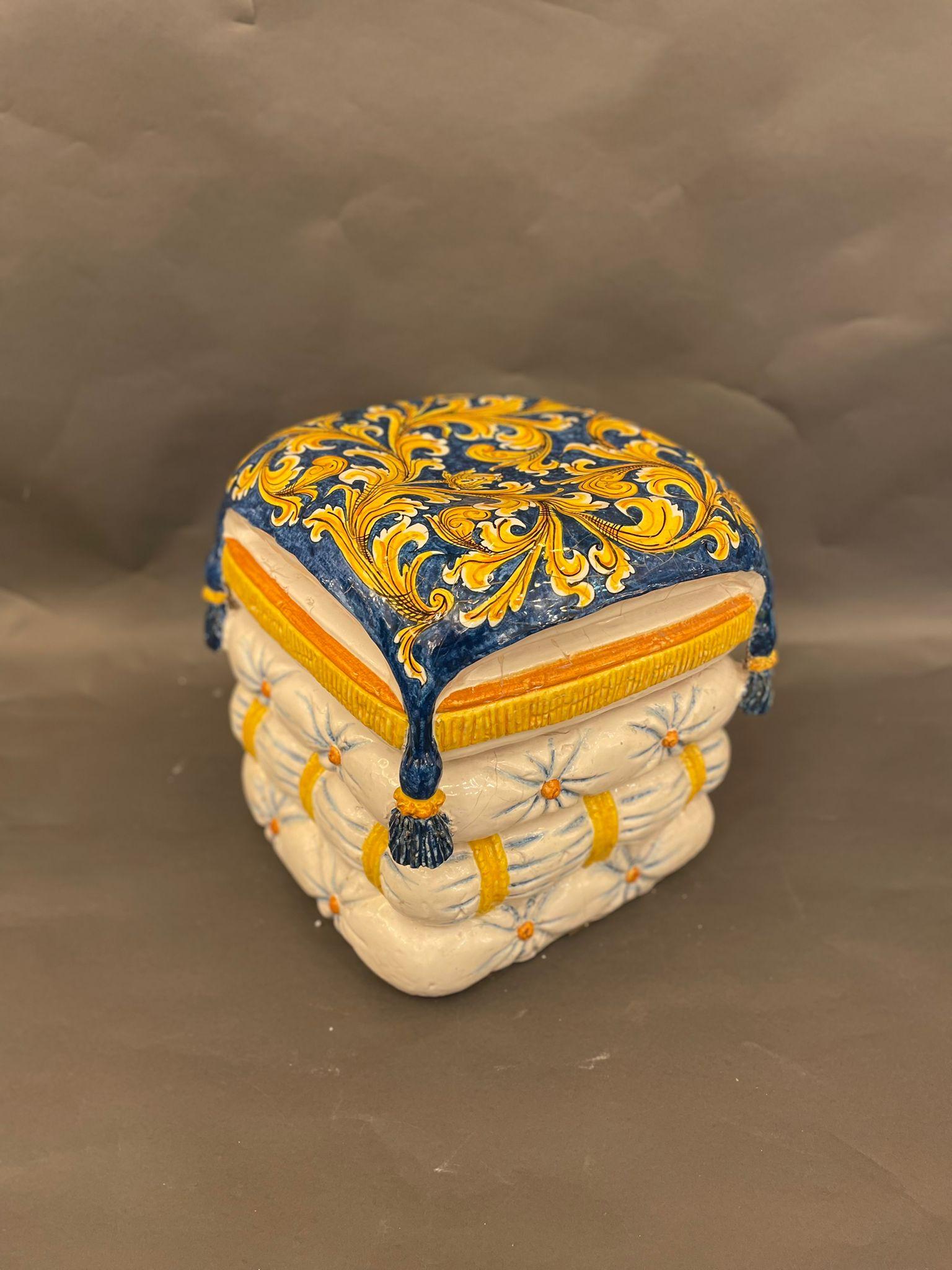 A rare Caltagirone Terracotta Ottoman hand painted in the traditional Sicilian blue, yellow and ocher tones. Sicily 1970s

Excellent vintage condition