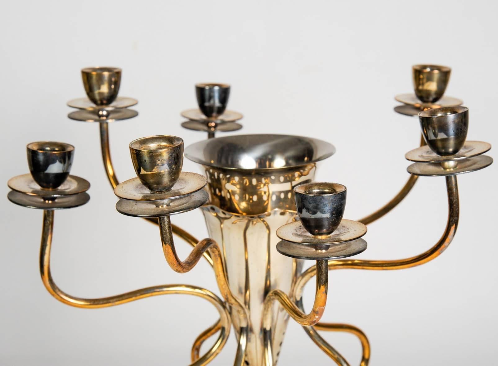 Silver plated candleholder with incorpored vase designed 1980s 
by Borek Sipek.
Price for 1 
Possibility of a second one to make a pair