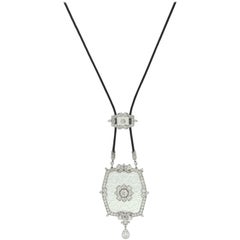 Cartier, rare pendentif Belle Époque en cristal de roche sculpté et diamants, boîte d'origine