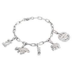 Cartier Bracelet à breloques rare en or blanc 18 carats serti de diamants