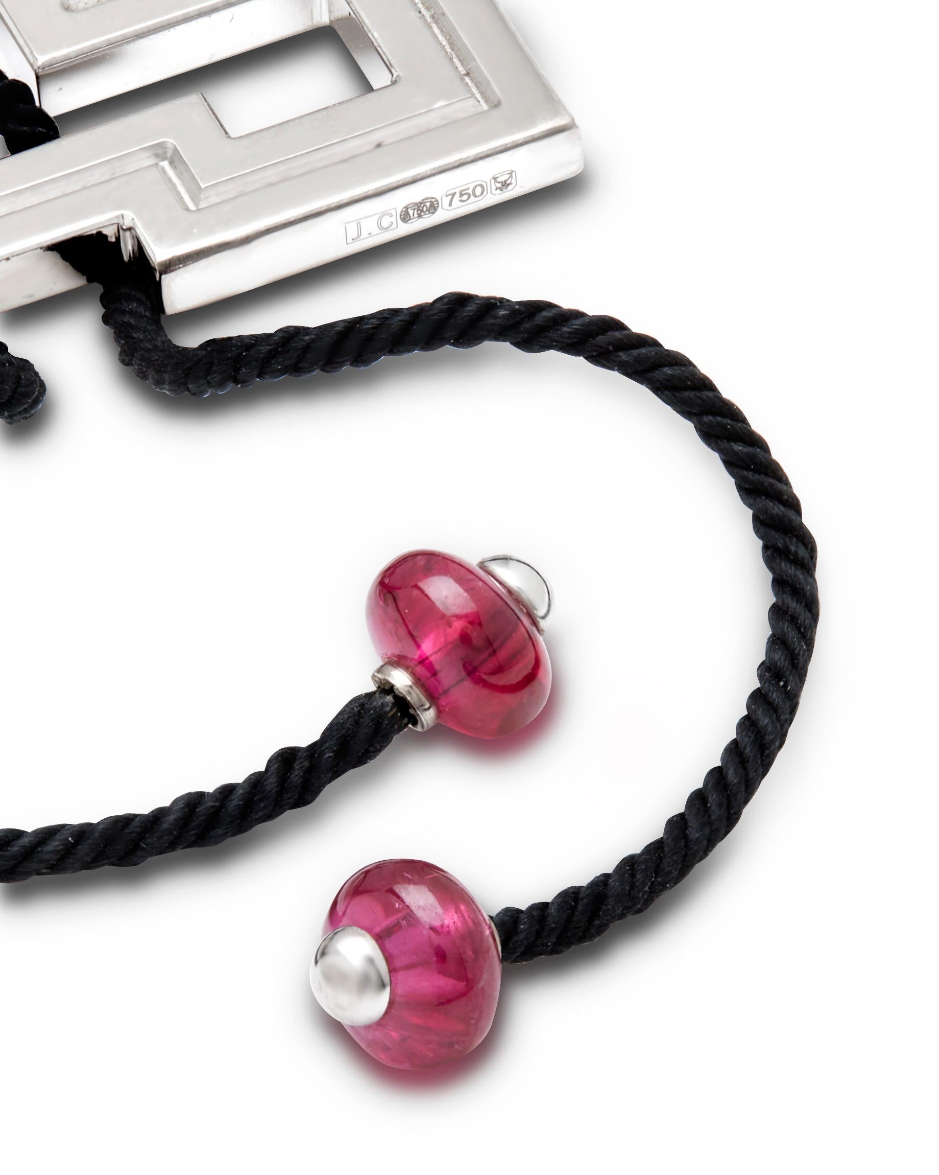 Rare Cartier Le Baiser Du Dragon white gold pendant on a black cord 2