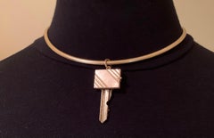 Rare Cartier Mid-20th Century 14K Yellow Gold Locket Book Key Pendant