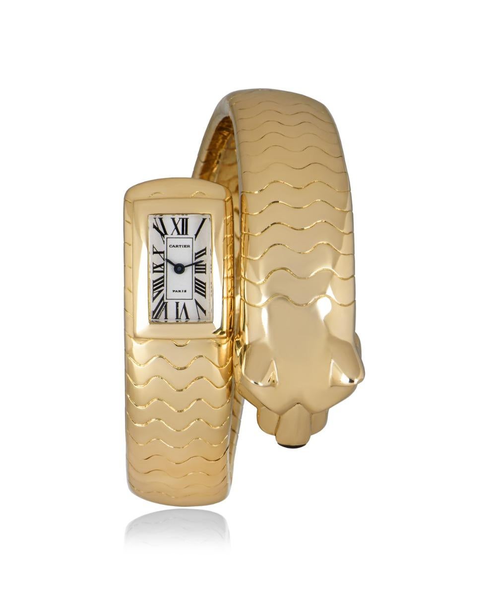 An inspired and complex creation from Cartier, this rare 33 mm Panthere Figurative Lakarda is in wonderful condition. Features a silver dial at one end of the linked yellow gold bracelet. The dial has Roman numerals, sword-shaped hands in blued