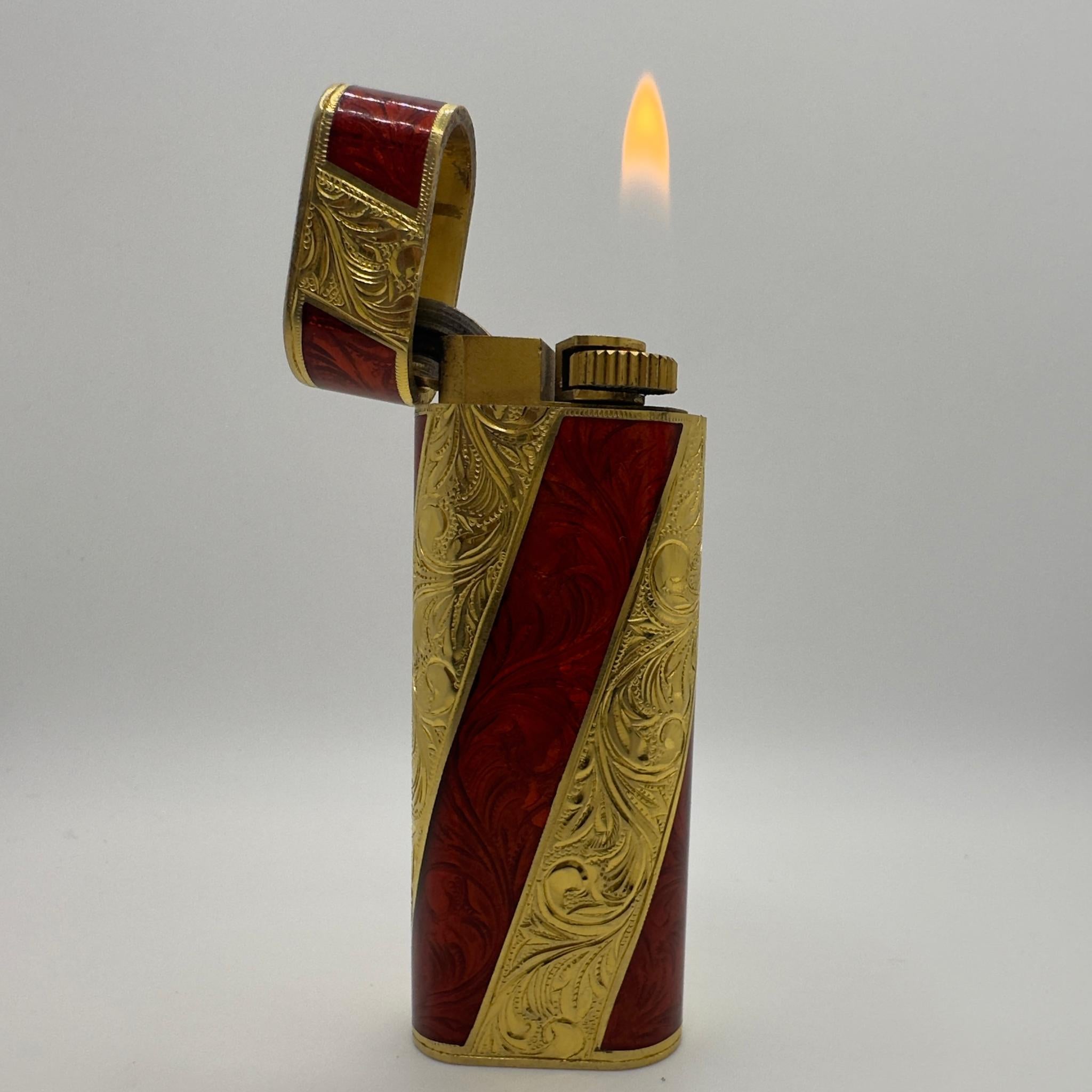 Baroque Rare Cartier Roy King Rollagas Gold and Red lacquer lighter 
