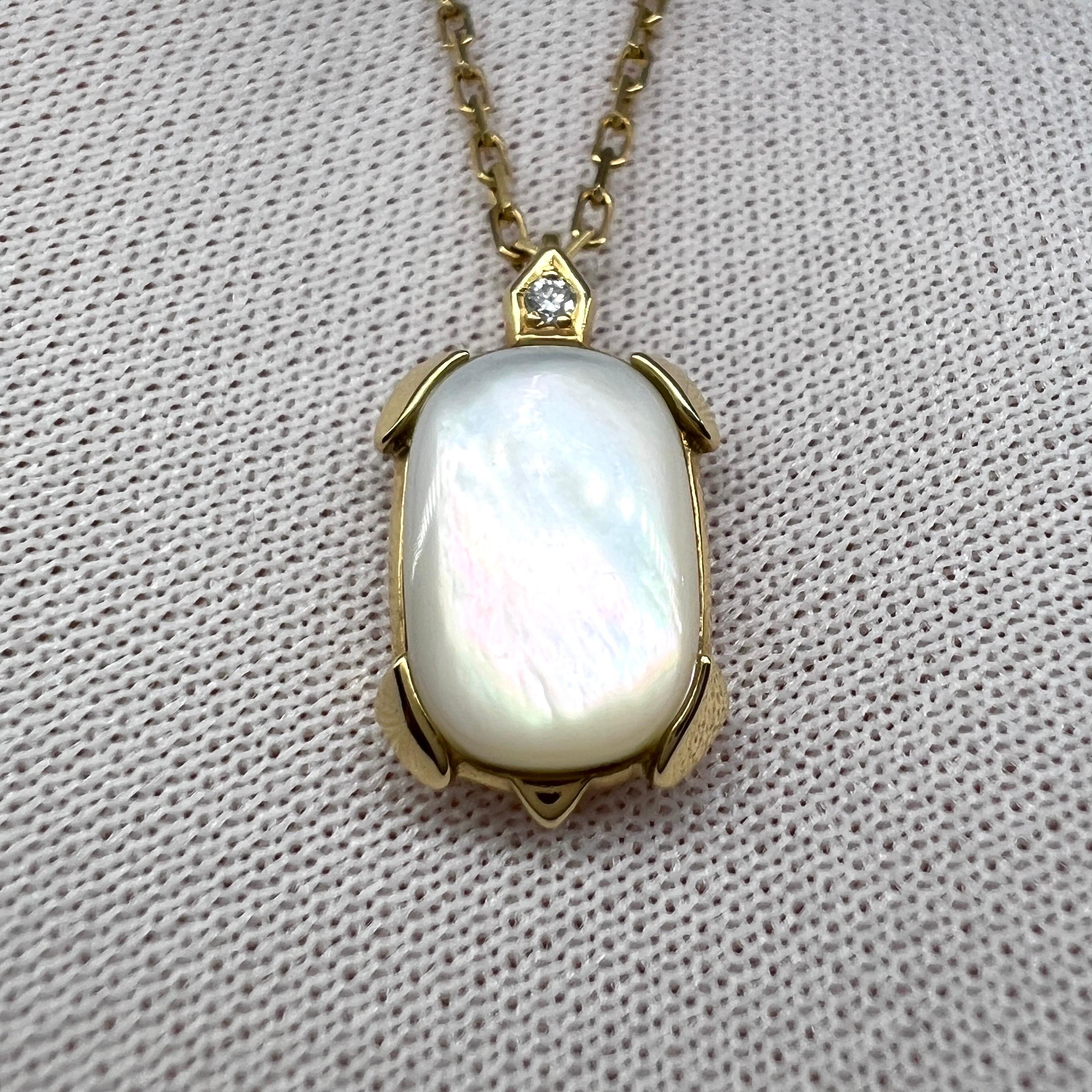 Rare Vintage Cartier Tortue Mother of Pearl & Diamond 18k Yellow Gold Pendant Necklace.

Stunning yellow gold necklace featuring a tortoise shaped pendant. Mother of pearl body with a diamond set in the head, this beautifully made pendant measures