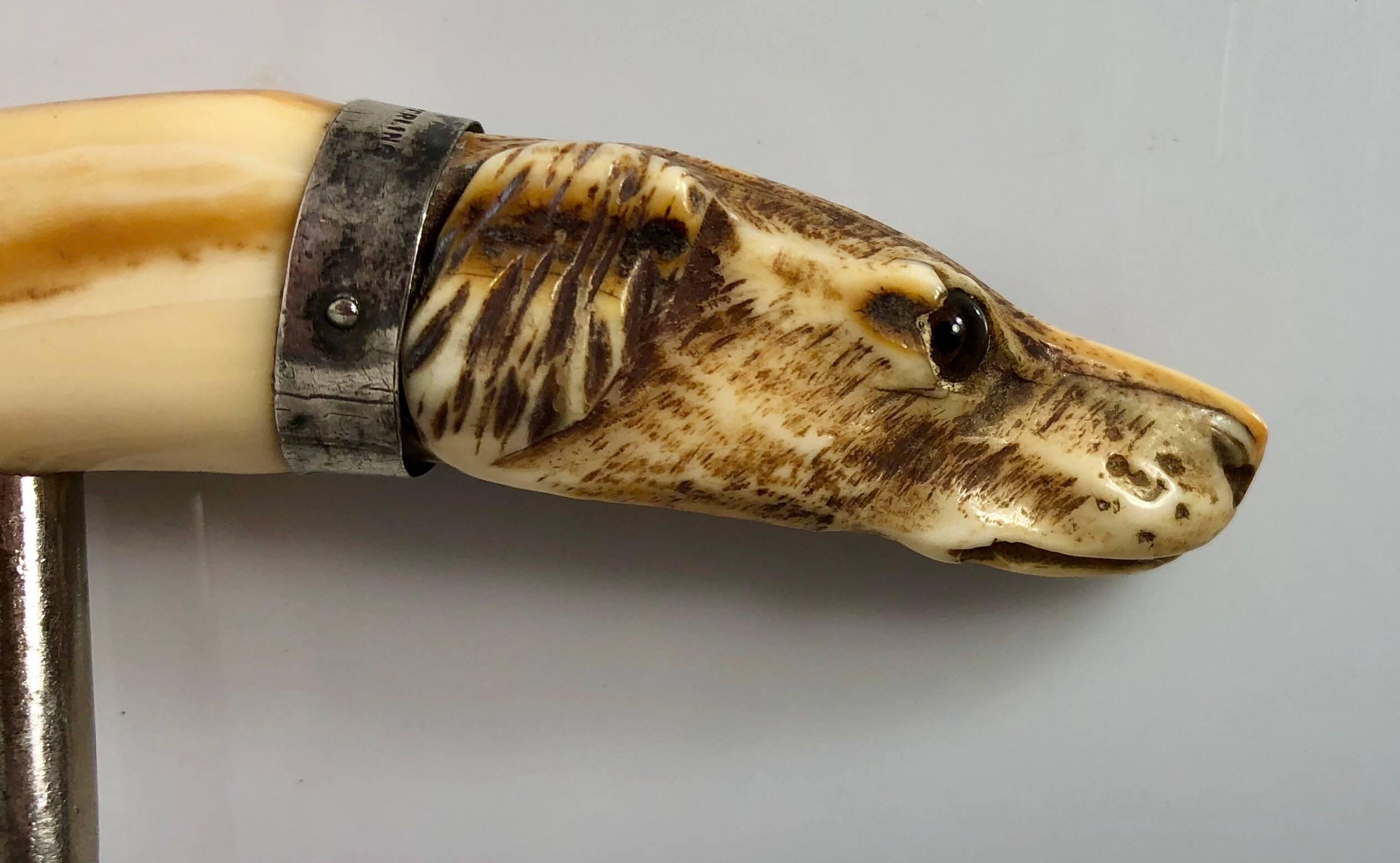 American Rare Carved Hunting Dog Corkscrew with Sterling Silver Mounts, circa 1890