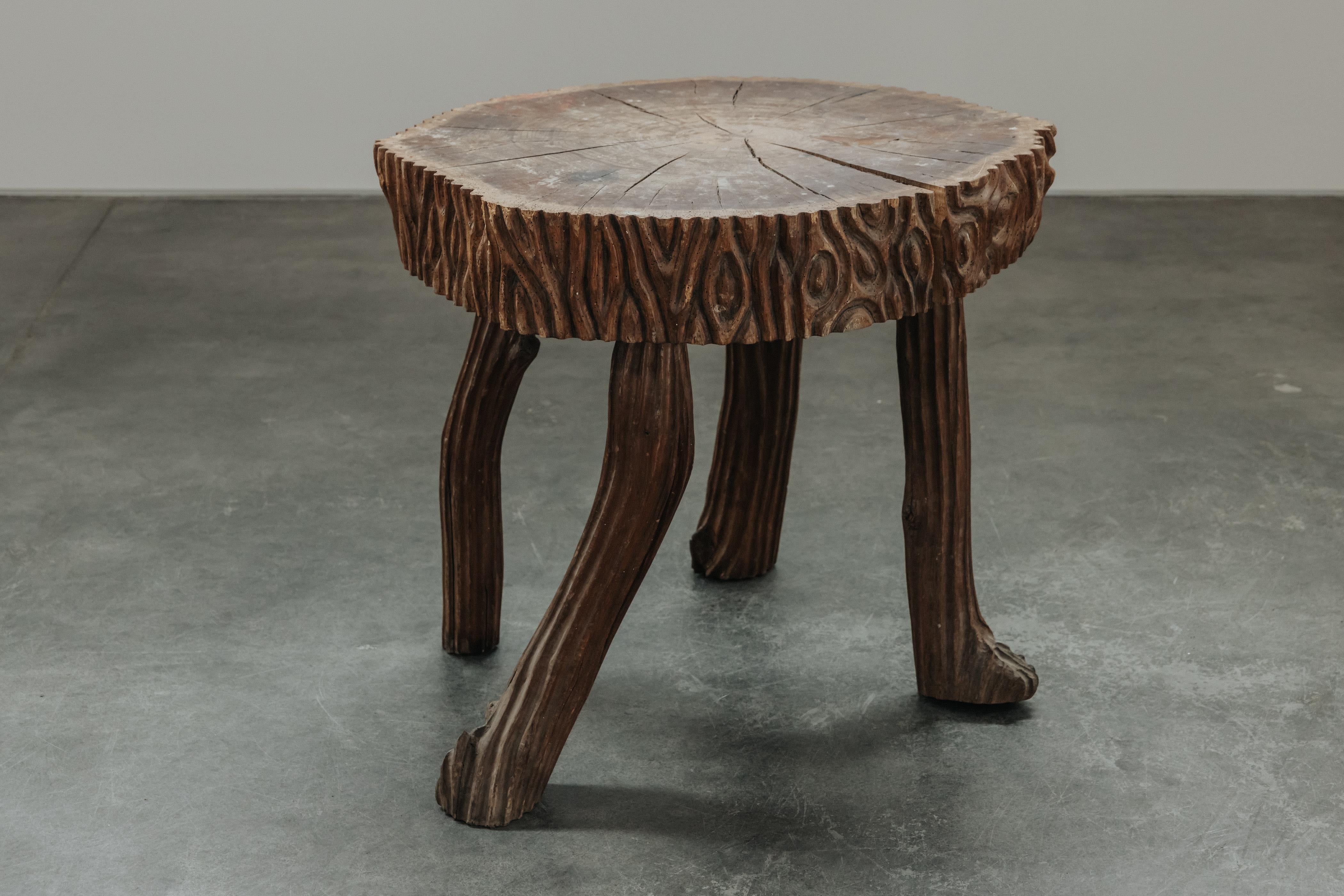 Rare Carved Pedestal Table From The Alps, Circa 1950.  Unusual model with carving on edge.  Great patina and use.