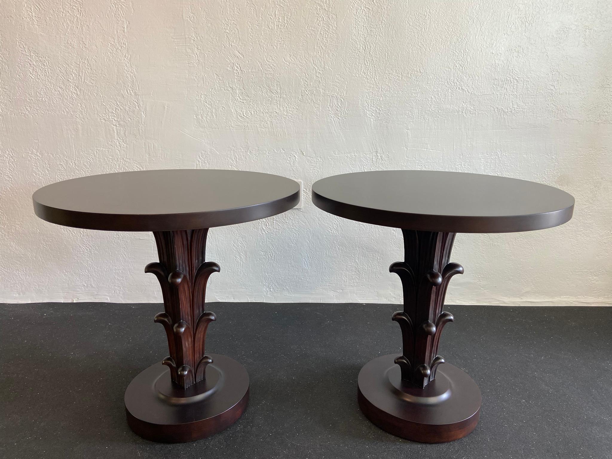 Rare pair of carved tables by T.H Robsjohn Gibbings For Widdicomb. John Stuart distribution labels intact and found on both tables. Refinished in the original dark mahogany finish. Exquisite early example of Gibbings work. 

Would work well in a