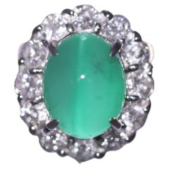 Seltener Platinring mit Katzenauge und Smaragd und Diamant