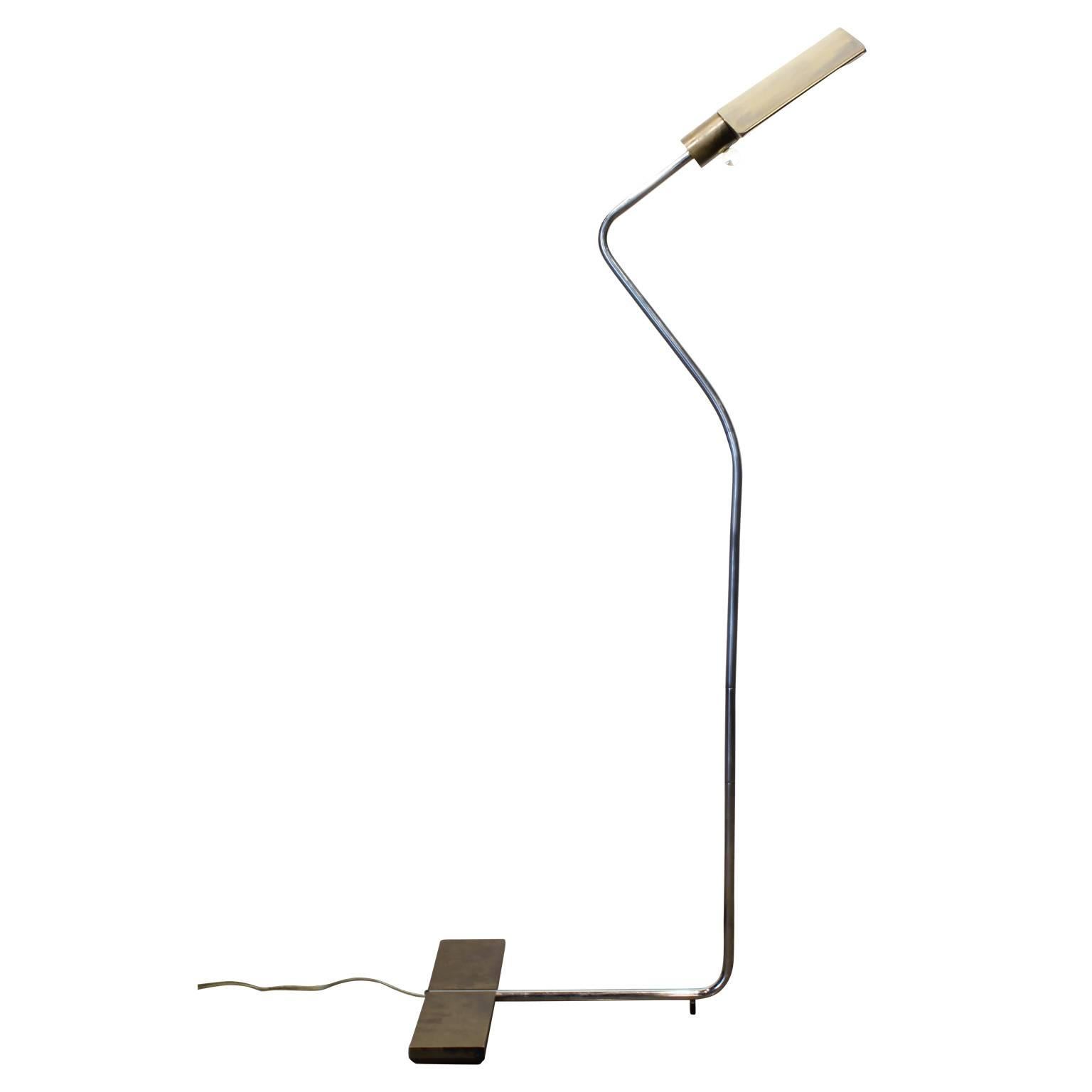 Gorgeous and rare early Cedric Hartman brass floor lamp with a Glass ball switch with a unique bend unlike any other Hartman lamps we've seen.