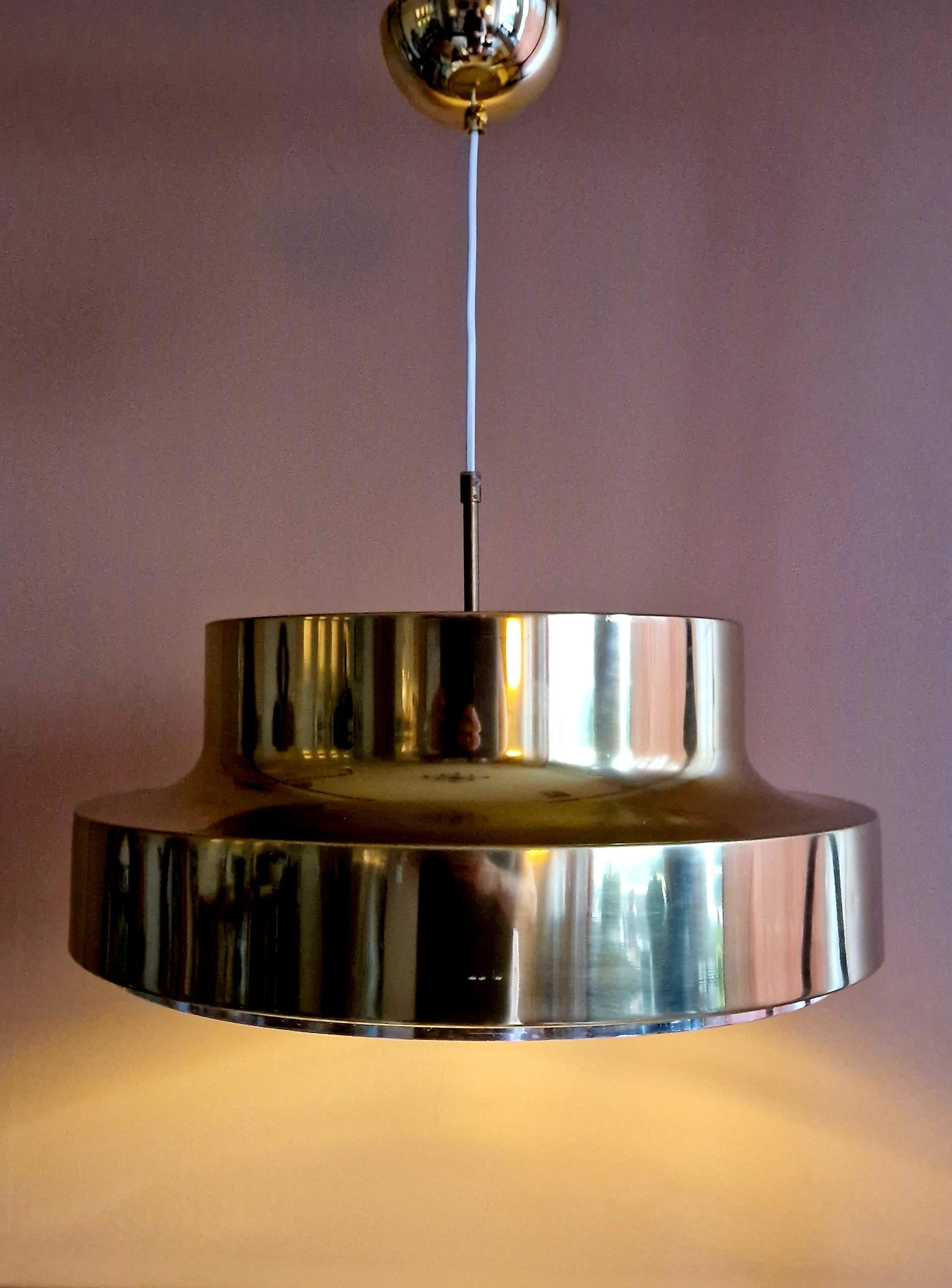A brass lacquered metall lamp. Made in Sweden by Falkenbergs Belysning in the 1970's. 
Condition consistent with age. 
New wiring and a new brass lacquered cup. 
