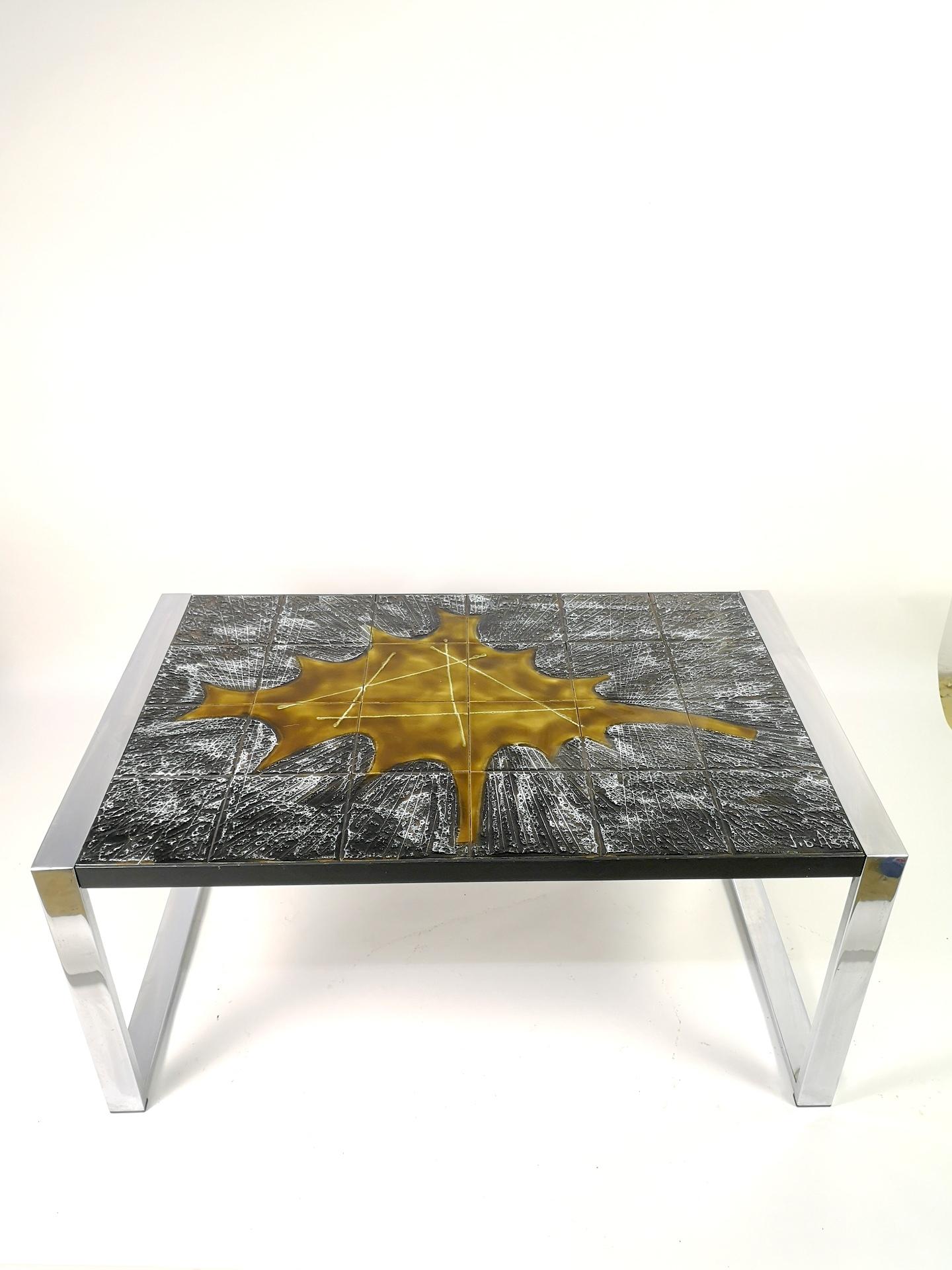 Mid-century modern or brutalist rectangular coffe table signed ceramic top and chrome plated steel base. Signed by ceramics artist Jean D'Asti and made in Vallauris, France, 1960s.