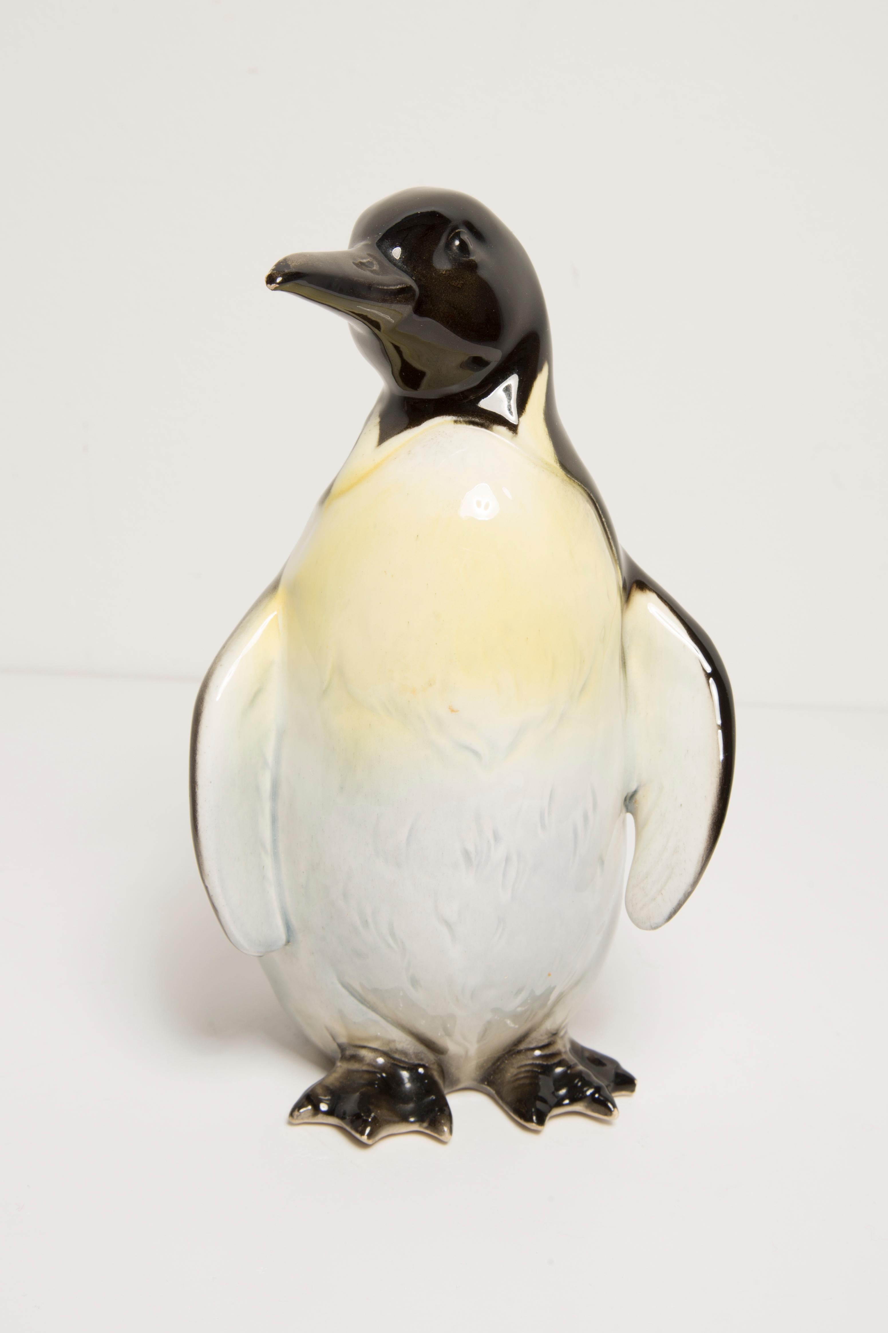 Painted ceramic, perfect condition. 
Beautiful and unique decorative sculpture. 
Penguin was produced in 1960s in Germany.