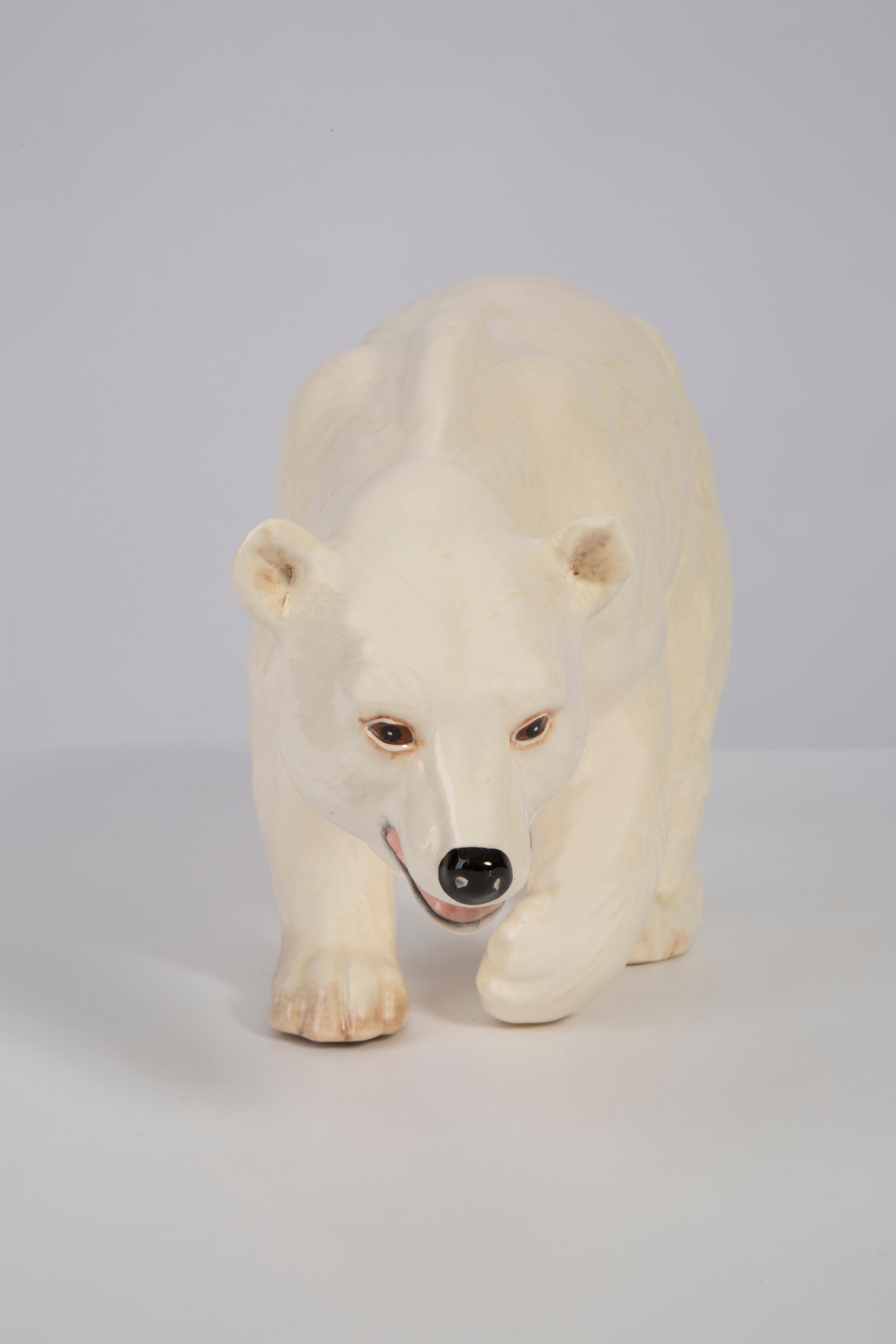 Painted ceramic, perfect condition. 
Beautiful and unique decorative sculpture. 
Polar bear was produced in 1960s in Germany.