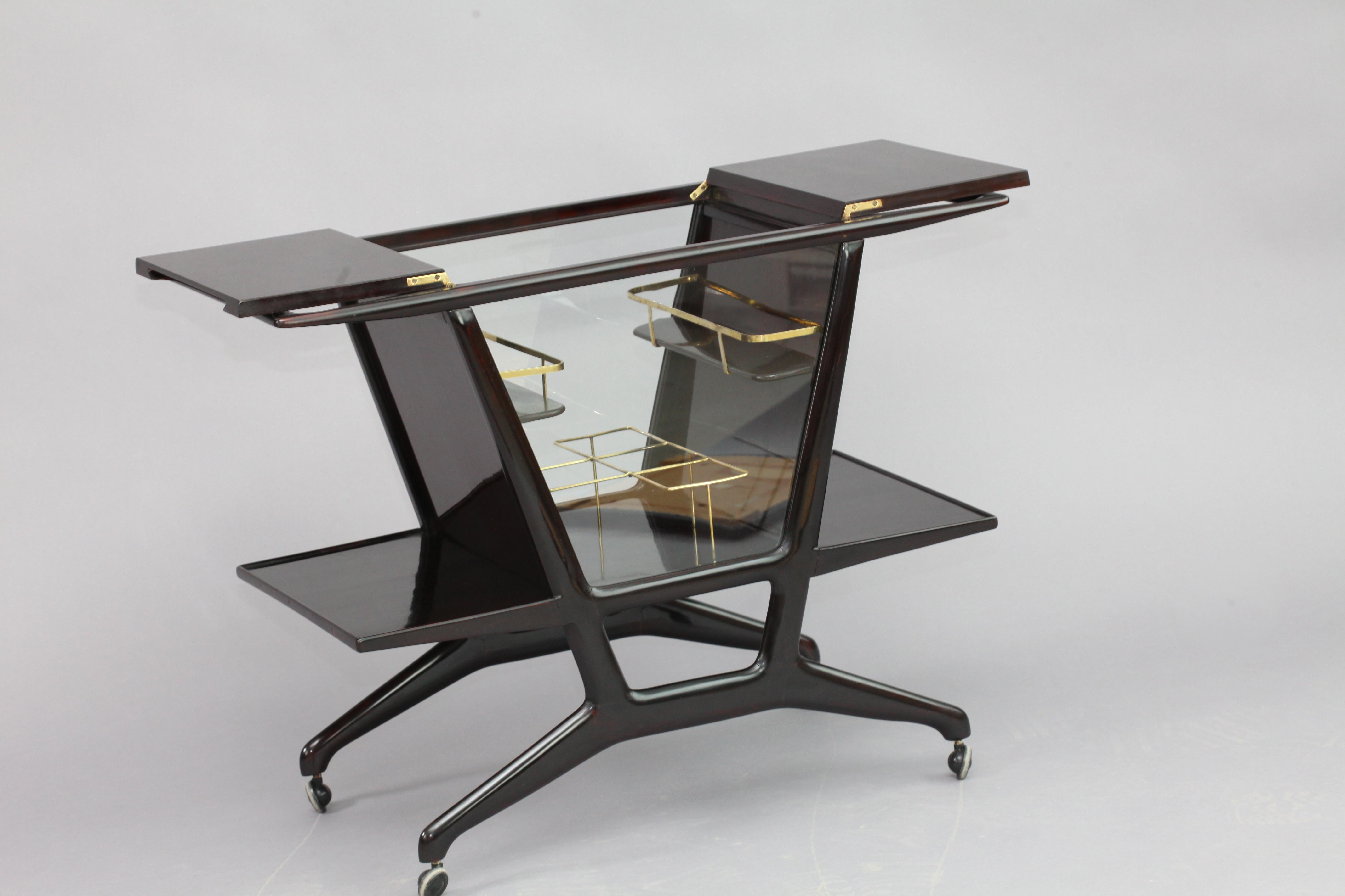 Very rare bar cart, 
designed Cesare Lacca,
Italy 1950.
foldable top, inside with bottle holders.