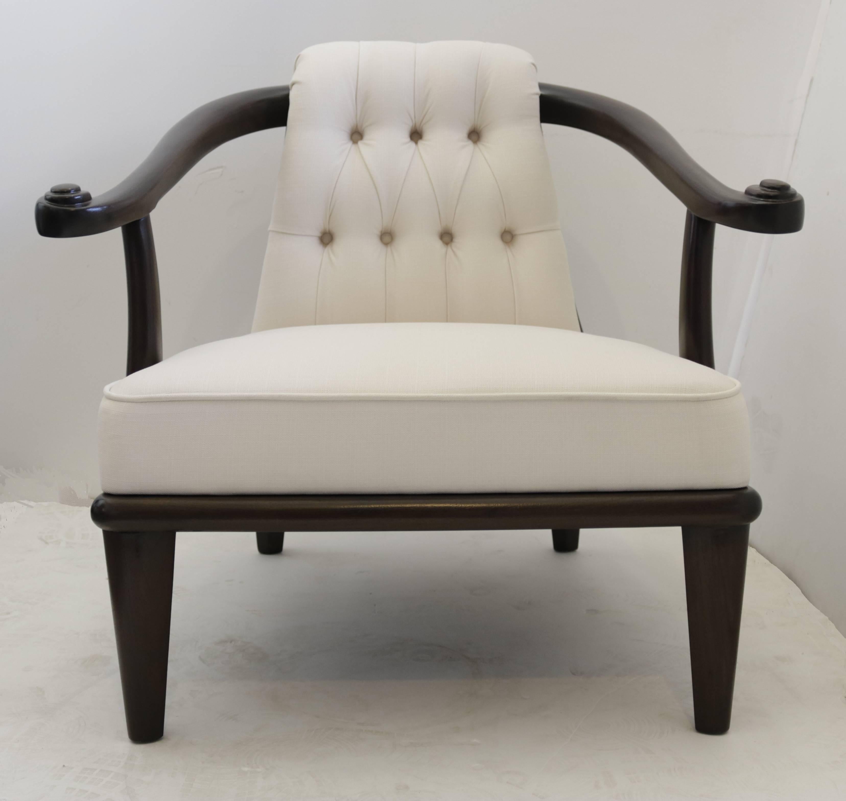 This very elegant and unique chair is made off ebonized mahogany and the back features a unique element that I cannot describe!
The back upholstery is tufted.
 