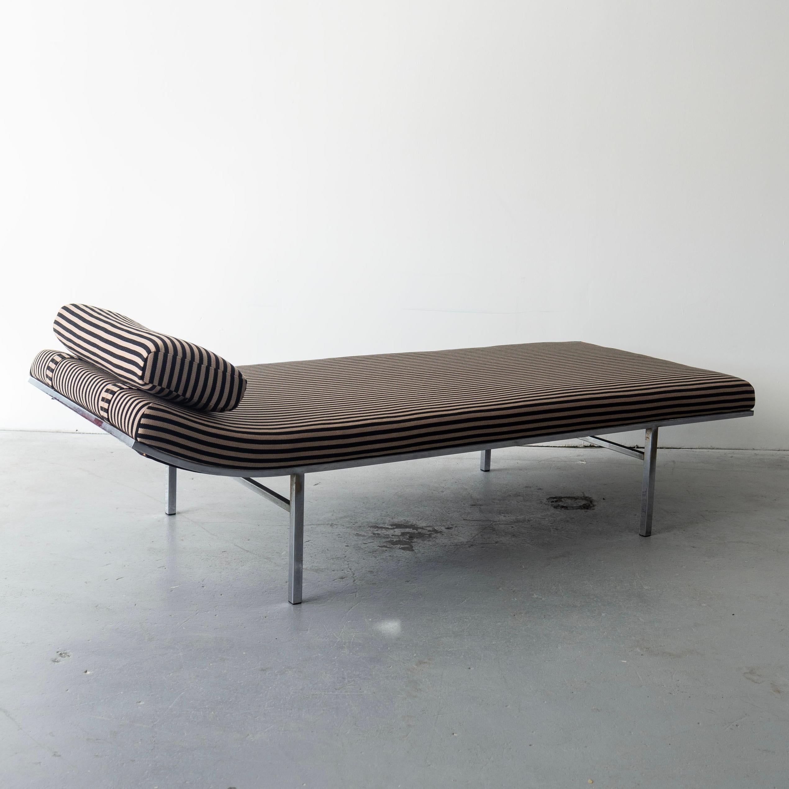 for Metropolitan, 1970s. This piece has been freshly reupholstered in Alexander Girard “toostripe 002,” produced by Maharam. It also has new foam and webbing.