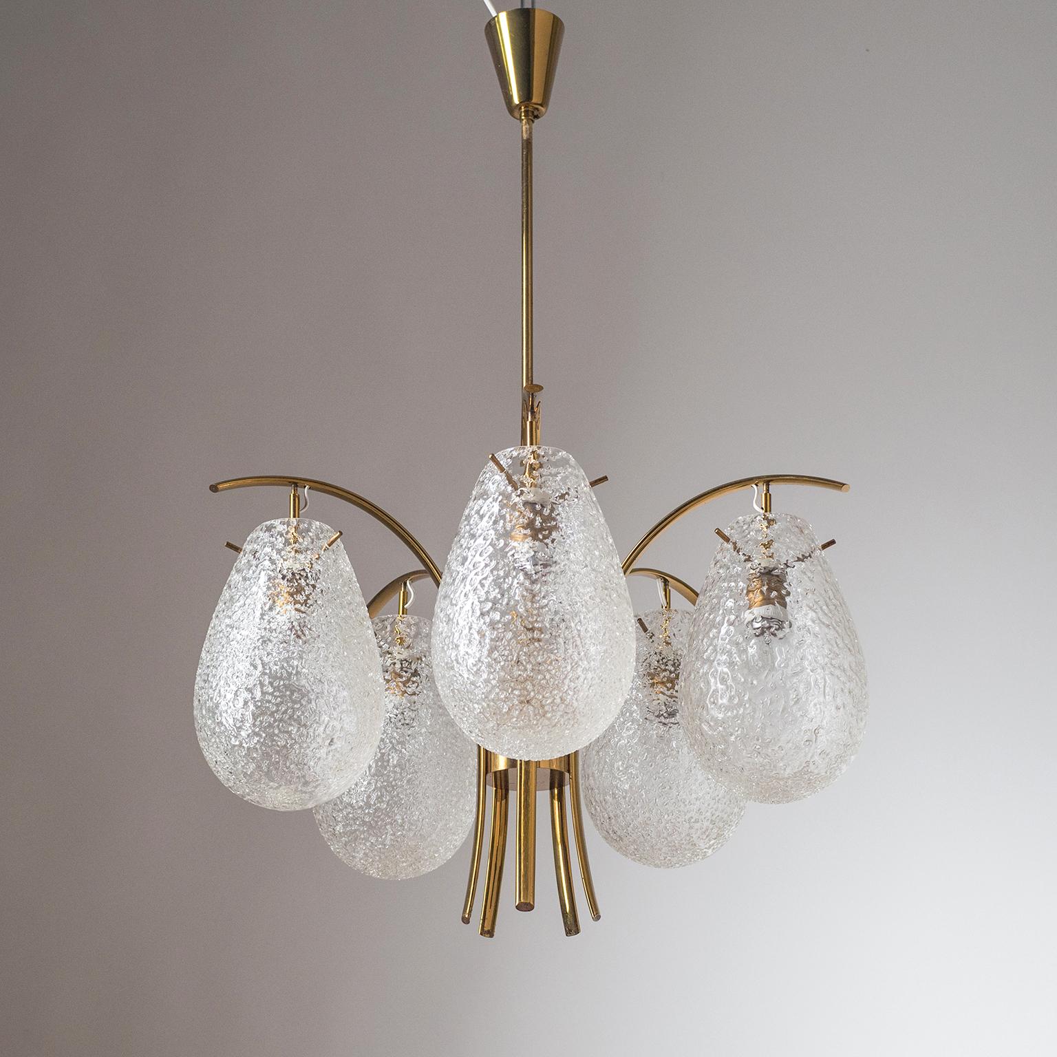 Very rare five-arm brass chandelier with unique textured glass globes, designed by Angelo Lelli and produced by Arredoluce in 1959. Lovely slender five-arm brass structure exquisitely crafted in typical Arredoluce manner. From each arm hangs a large