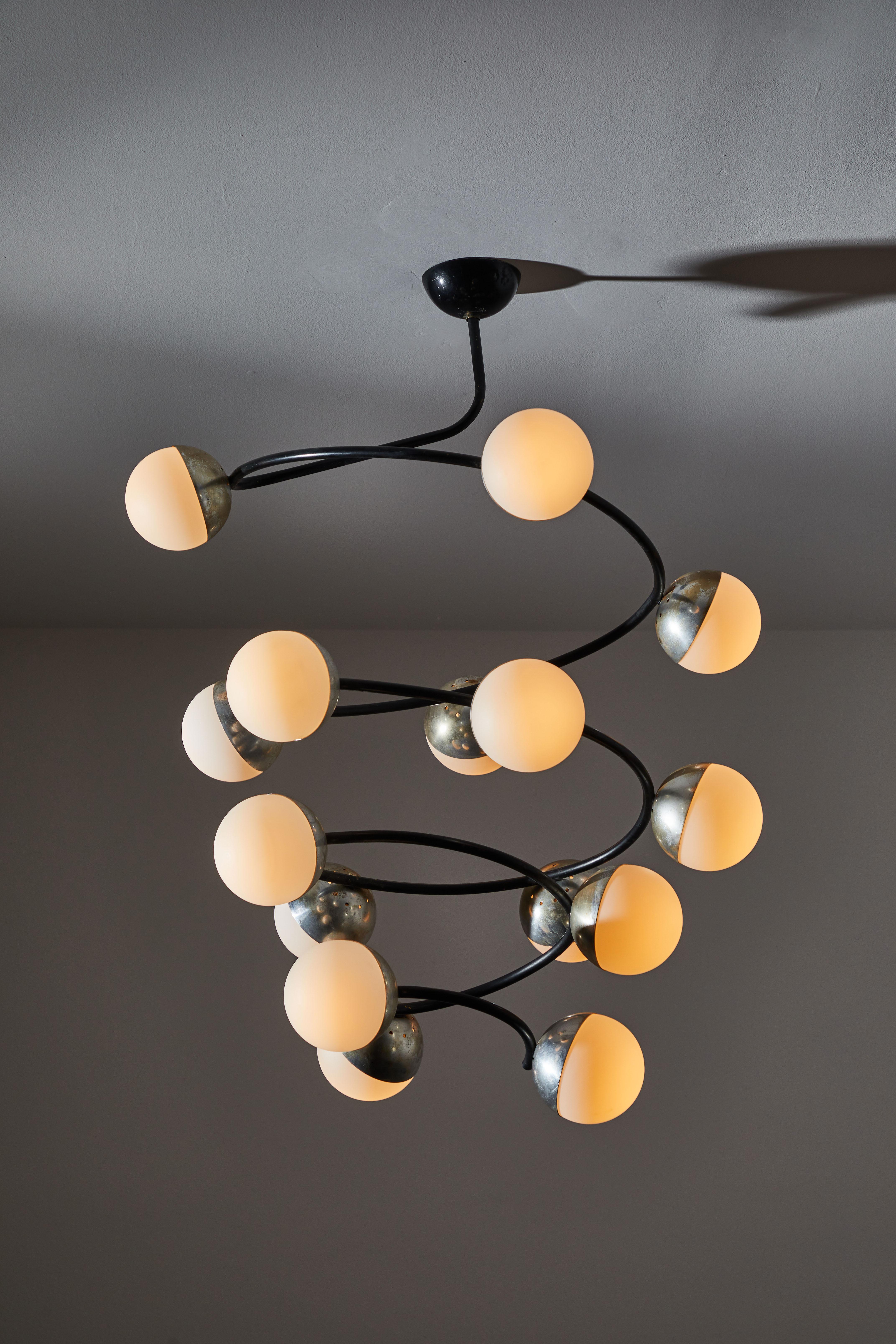 Rare Spiral chandelier by Stilnovo. Manufactured in Italy, circa 1950s. Aluminum with brushed satin glass diffusers. Wired for U.S. standards. Original canopy. We recommend 15 E14 European candelabra 25w maximum bulbs. Bulbs provided as a one time