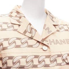 rare CHANEL 01A Vintage Runway beige grey CC logo chain print coat jacket FR42