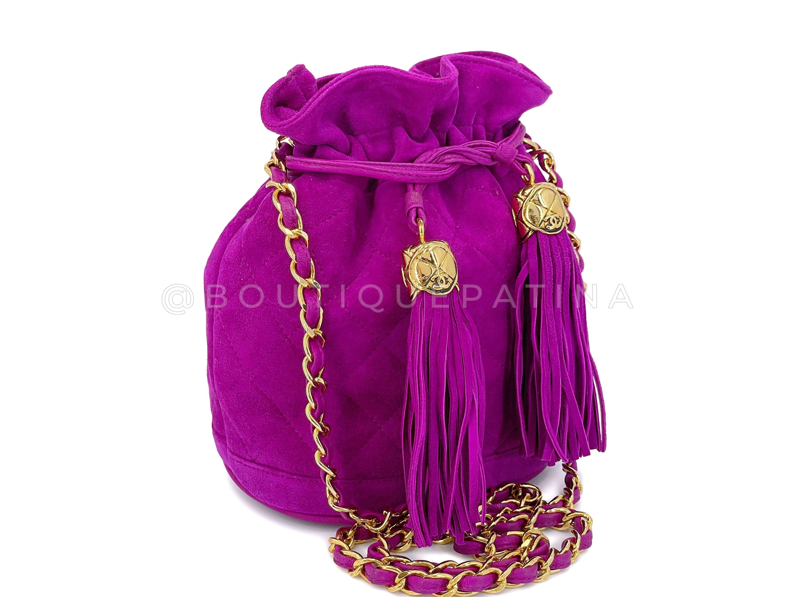 Store item: 67450
Rare Chanel 1990 Pink-Purple Suede Mini Drawstring Bucket Bag 24k GHW is a super rare collectible - not just for its color and material, but the condition. It is in nearly new condition, and one will be hard-pressed to ever find