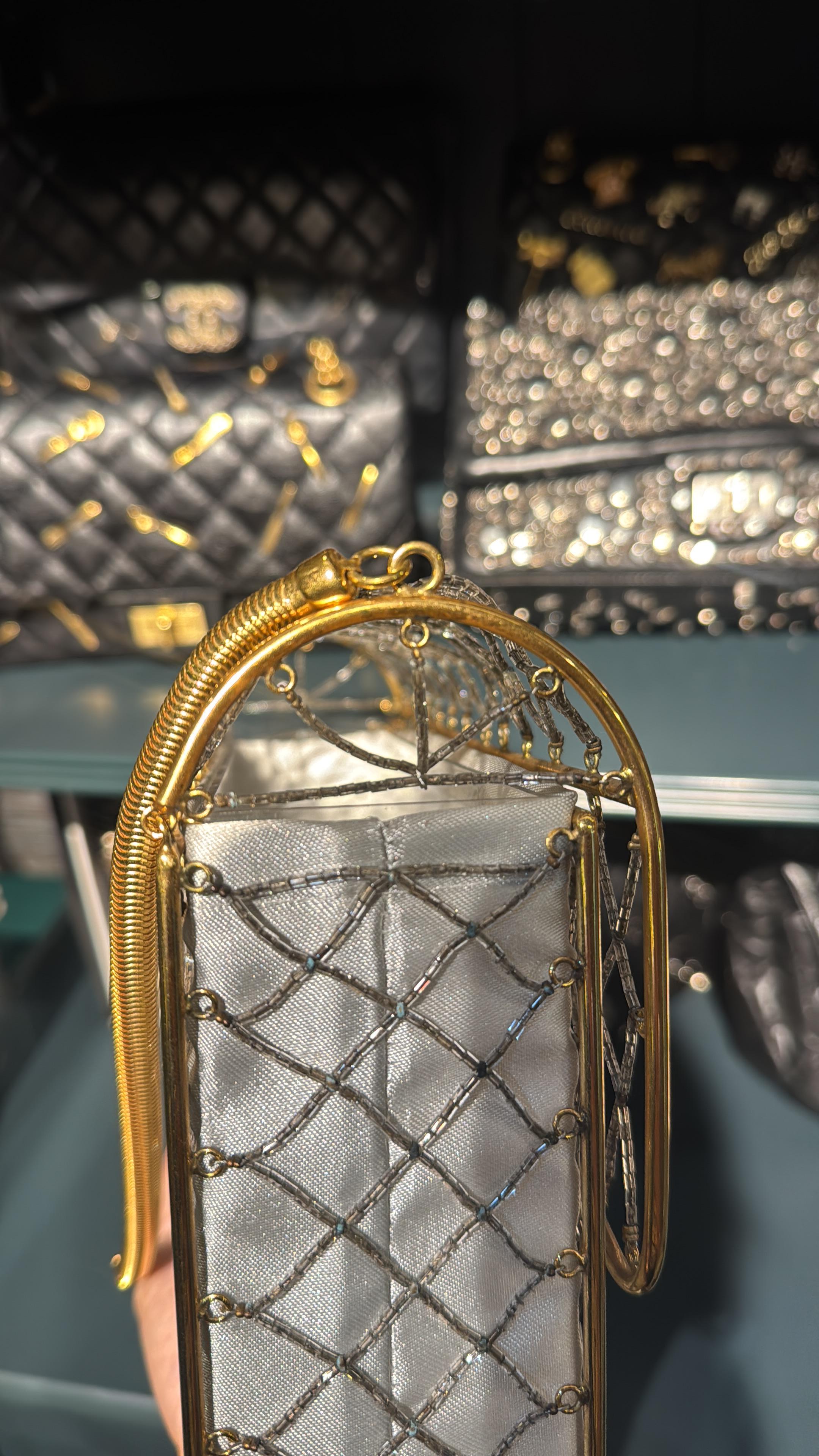 Super rare beaded quilting medium cage flap bag from the 90s. Overall still in good condition with minor tarnishing on the small hardware details. Slight loose bead hook but is easily fixable. Comes with its pvc lining and custom cloth. Will be