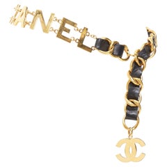 rare CHANEL 1993 Vintage Spell Out logo black leather interwoven gold chain belt