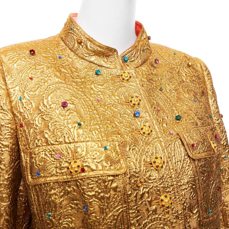 rare CHANEL 1996 Runway  Byzantine gold brocade rhinestone embellished jacket FR44
Reference: BMPA/A00261
Brand: Chanel
Designer: Karl Lagerfeld
Model: P08269W02315
Collection: Fall Winter 1996 - Runway
As seen on: Lady Gaga
Material: Wool,