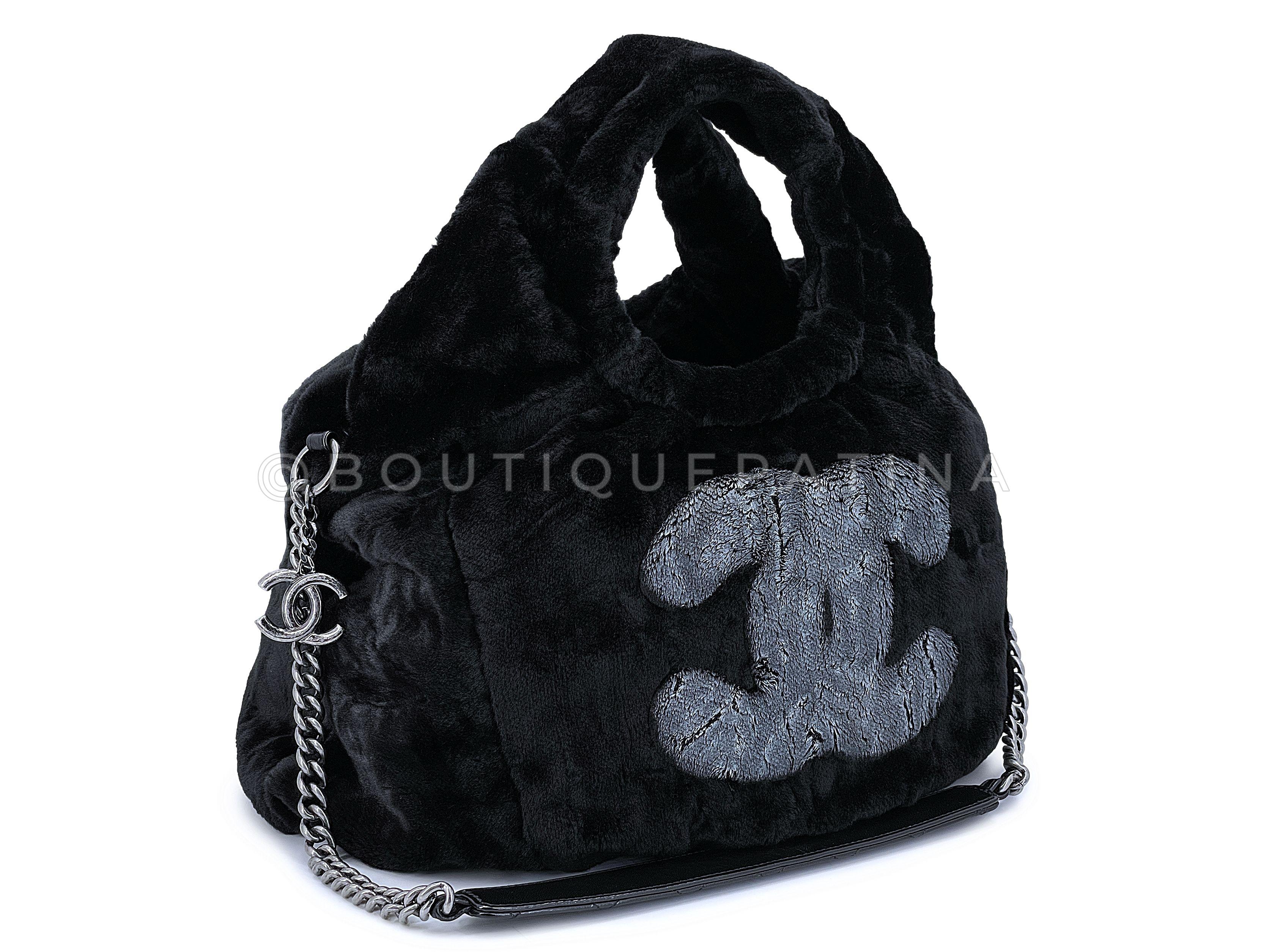 Store item: 67704
Rare Chanel 2010 Black Logo Fur Hobo Tote Bag SHW is a versatile hobo tote in faux fur and bold logos on front and back.

Oversized 