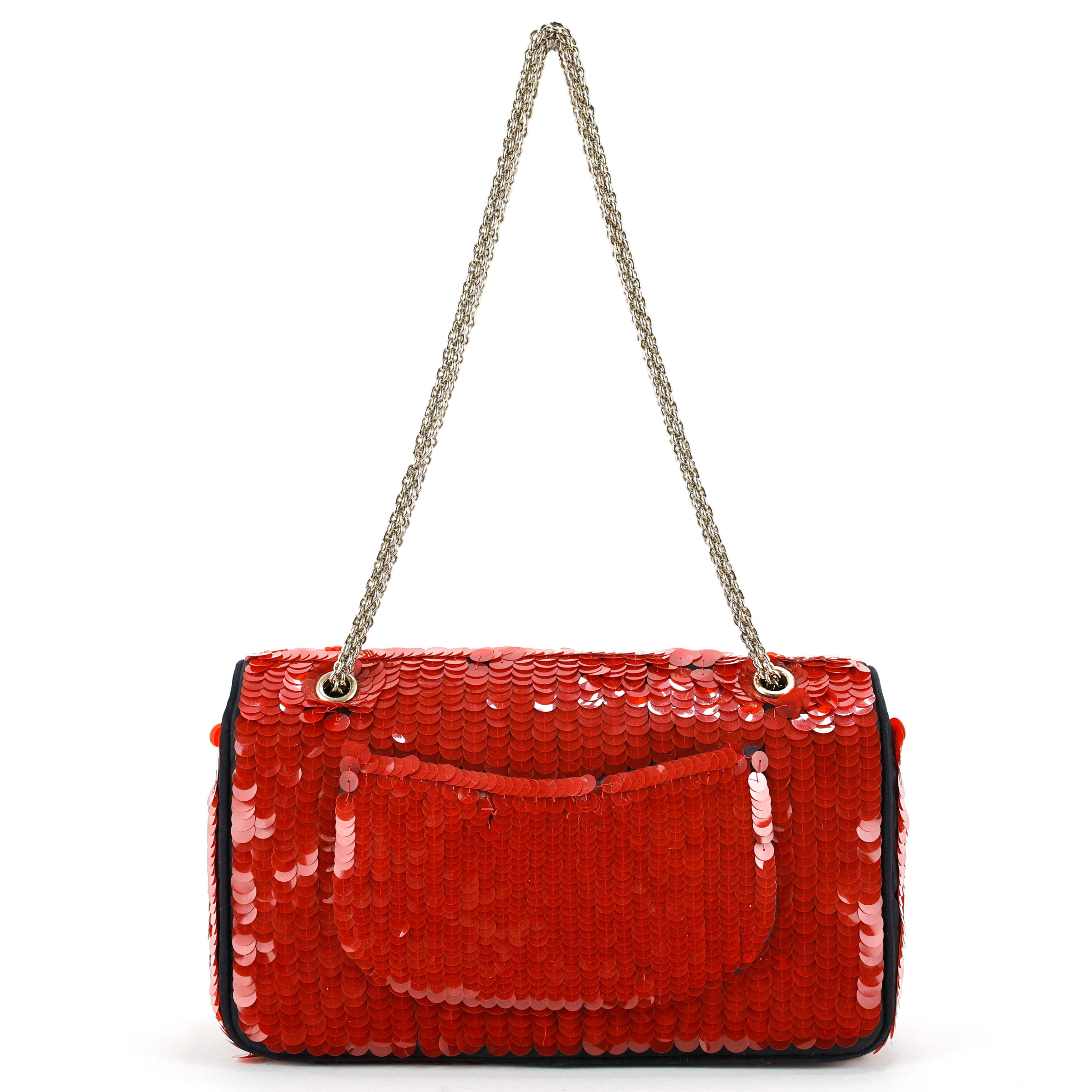 Rare Chanel 2010 Shanghai Red Sequins Timeless Double Flap Bag, in black silk with hand-embroidered red sequins, brass/gold hardware.

Condition:
Good, to note: some missing sequins.

Measurements:
26cm x 15cm x 7cm.