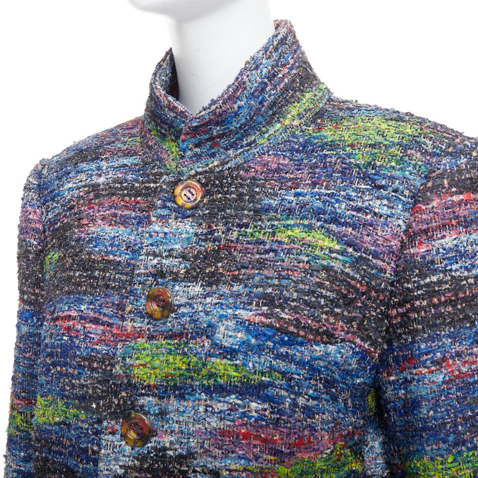 rare CHANEL 2015 Runway blue spray painted Fantasy tweed jacket FR46
Reference: BMPA/A00264
Brand: Chanel
Designer: Karl Lagerfeld
Model: P51443V38272
Collection: Spring Summer 2015 - Runway
Material: Nylon, Polyester
Color: Blue, Green
Pattern: