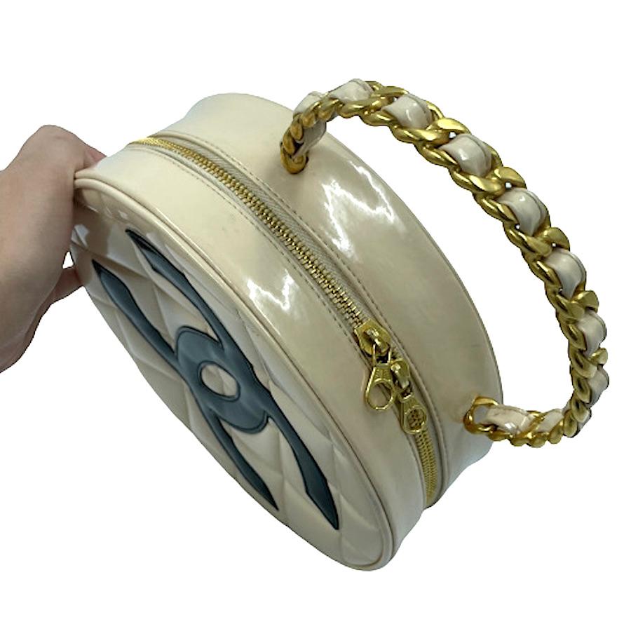 Beige Chanel - Sac à main rond beige, rare, années 90 en vente