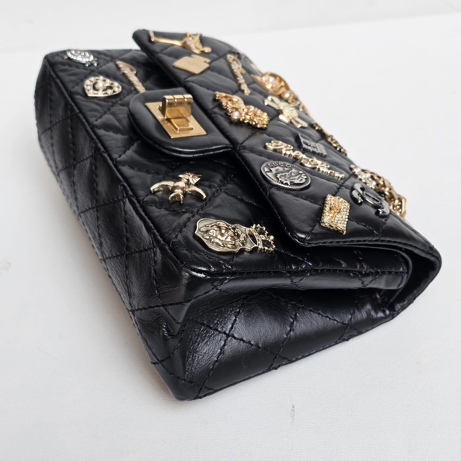 Women's or Men's Rare Chanel Black Aged Calfskin Charm 2.55 Mini Reissue Flap Vag