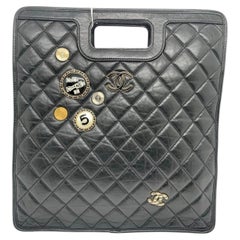 Rare Chanel Black Quilted Aged Calfskin Charms Cut Out Handle Shopping Tote