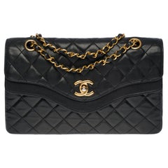 Used Rare Chanel Classic double Flap shoulder bag in black quilted lambskin, GHW