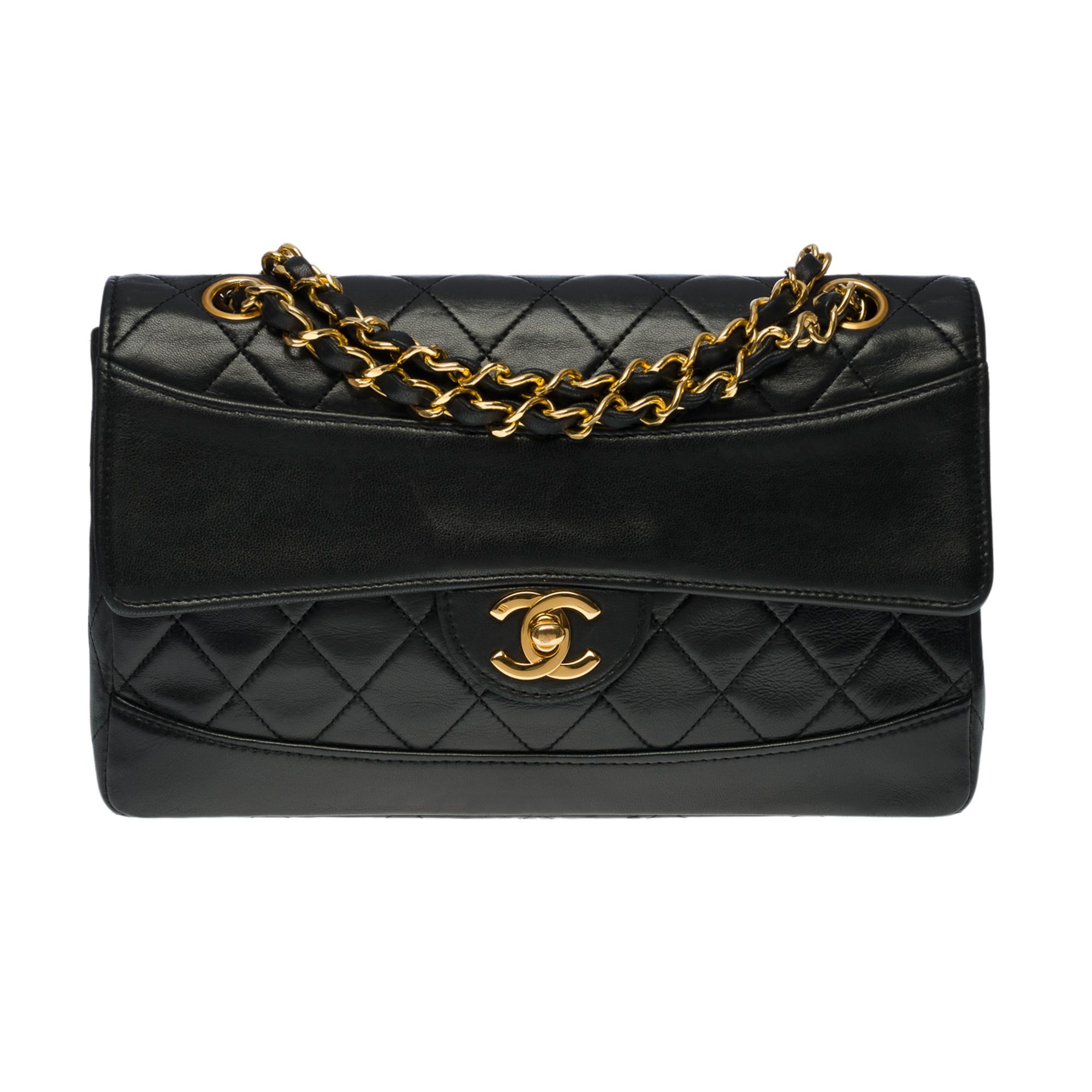 Beautiful Chanel Timeless/Classic Flap bag 23 cm in black quilted leather, gold-tone hardware, a gold-tone metal chain handle interlaced with black leather for a shoulder and shoulder strap, a dissociable black quilted leather pouch
Backpack