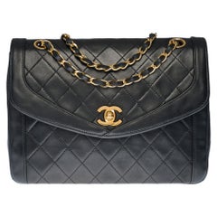 Rare Chanel Classic shoulder bag in black quilted leather and gold hardware