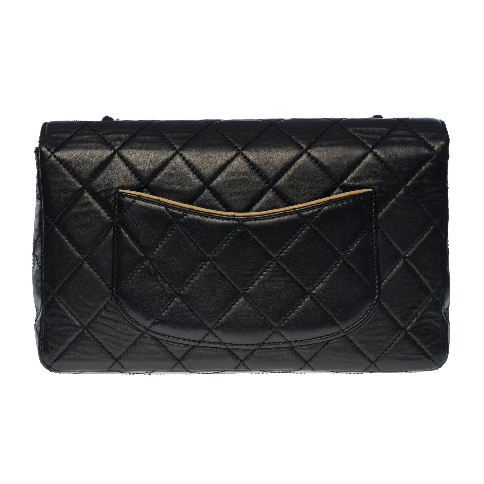 Gorgeous Chanel Timeless Medium Limited Edition single flap shoulder bag in Black & Beige Two-Tone quilted lamb leather, matt silver metal hardware, black leather Interlaced silver metal chain
closure by flap, clasp signed CC silver matt
Black