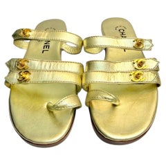 Rare Chanel gold metallic lambskin CC turnlock sandals