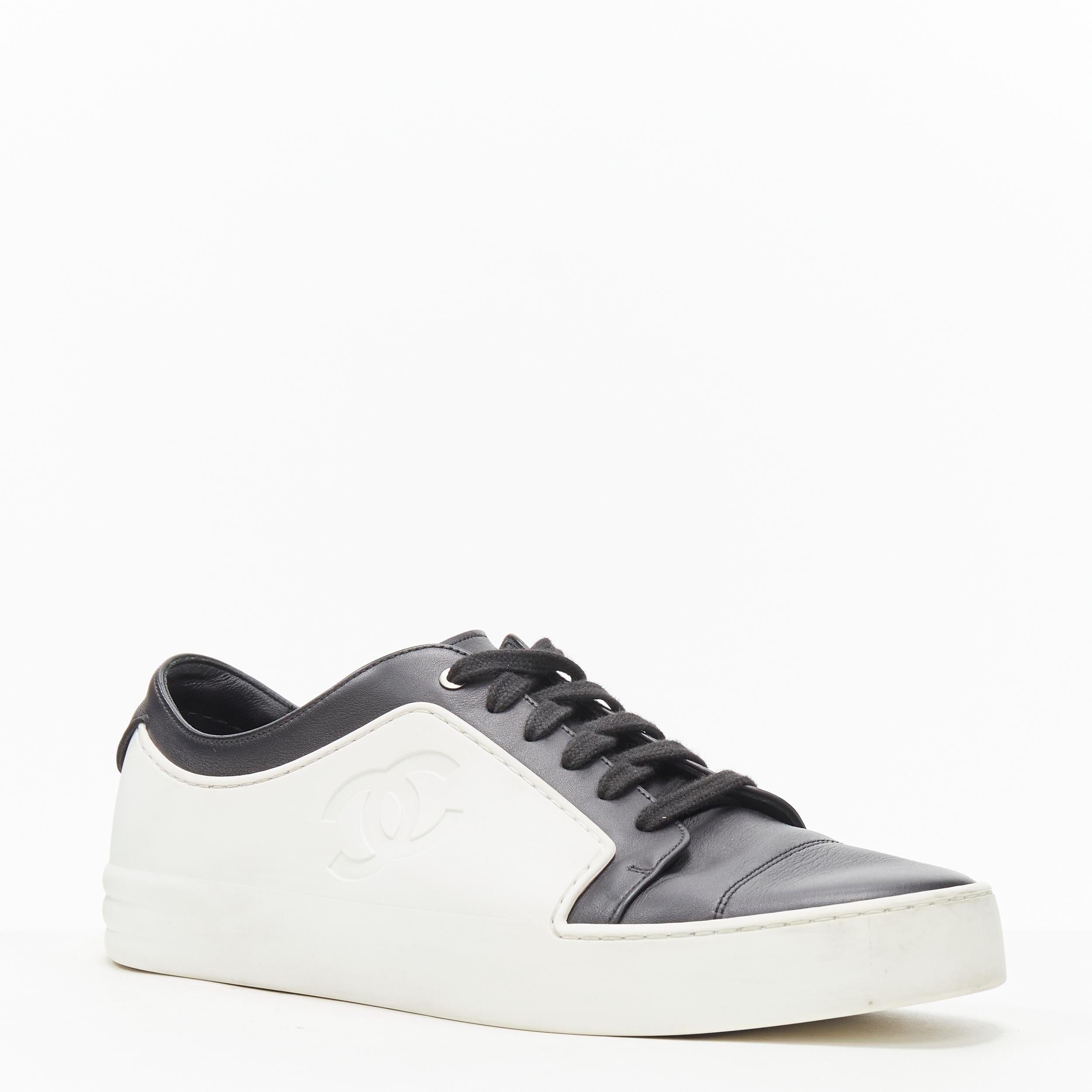rare CHANEL interlocking CC white rubber black leather low top sneaker EU43 Reference: TGAS/B01066 
Brand: Chanel 
Model: CC rubber black leather sneaker 
Material: Rubber 
Color: Black 
Pattern: Solid 
Closure: Lace Up 
Extra Detail: White rubber