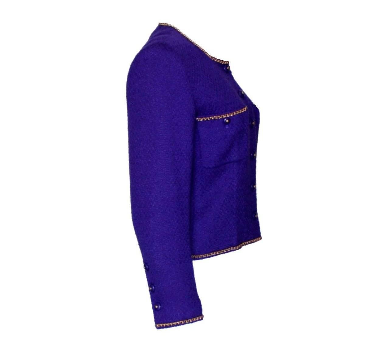 A truly special piece!
Chanel signature jacket
Designed by Karl Lagerfeld
Beautiful purple tweed fabric by Maison Lesage
Chain trimming details
Two front pockets
Fitted style
CC logo buttons
Fully lined with purple CC logo silk
Chain at hem inside